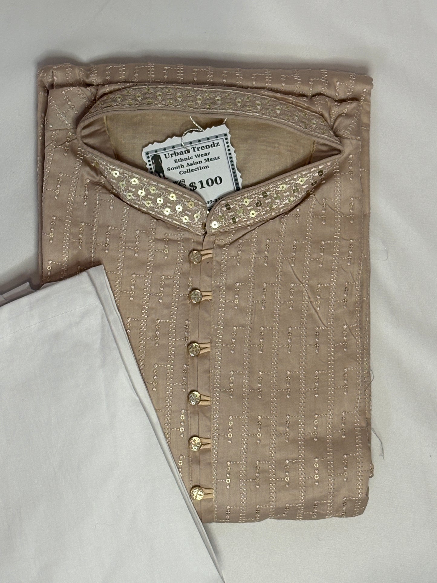 Champagne with Intricate sequin and embroidery work, paired with a white pajama