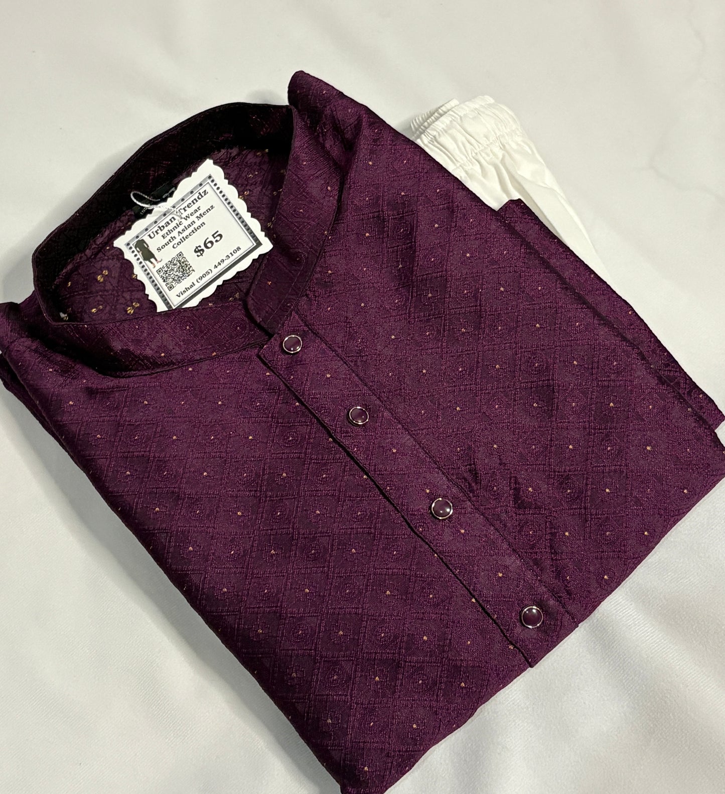 Deep wine colored kurta with geometric diamond pattern comes with White pajama