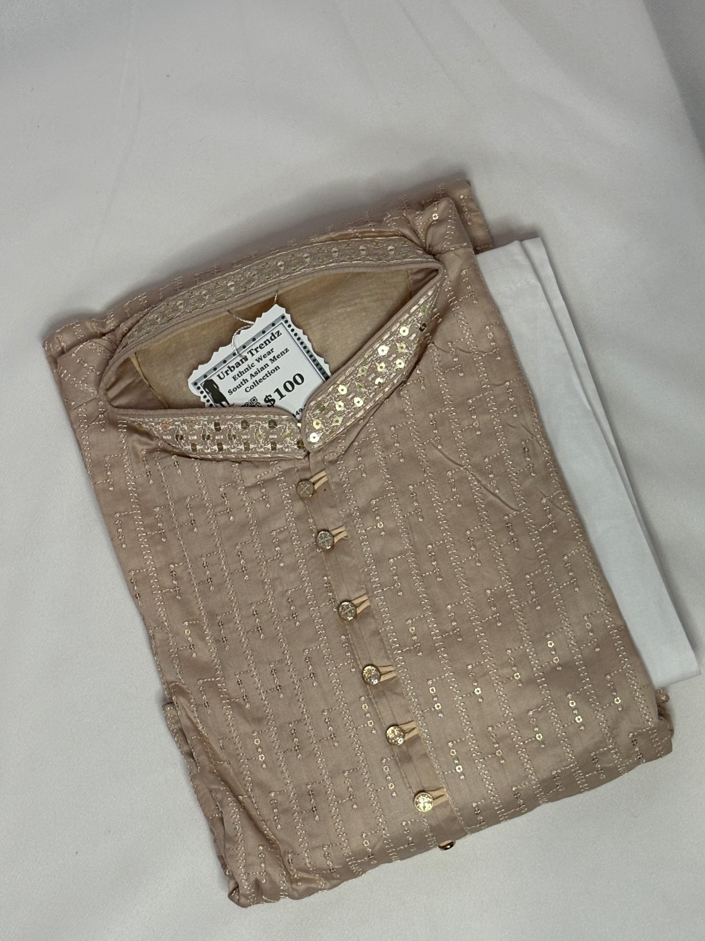 Champagne with Intricate sequin and embroidery work, paired with a white pajama