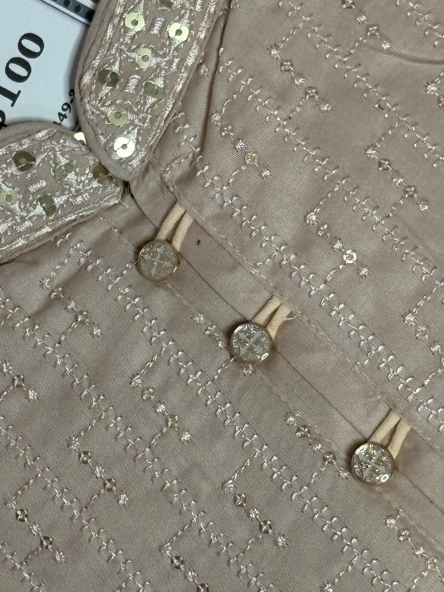 Champagne with Intricate sequin and embroidery work, paired with a white pajama