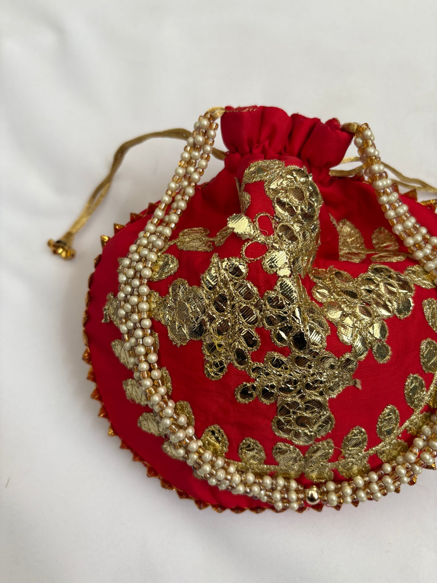 Ruby Gold Potli Bag