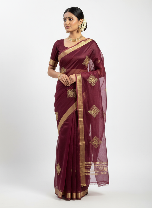 Maroon Saree with Very Small Golden Motifs on Female Model