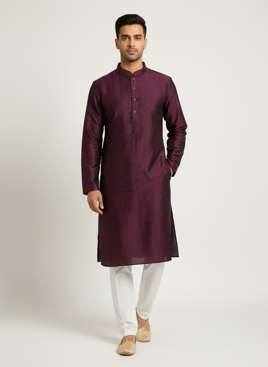 Model wearing burgundy geometric kurta with white pajama