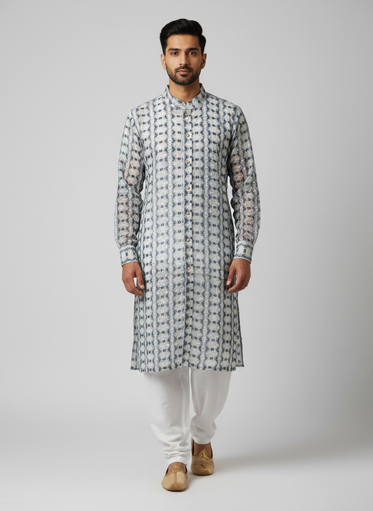 Model wearing buttoned up Chikankari kurta with white pajama
